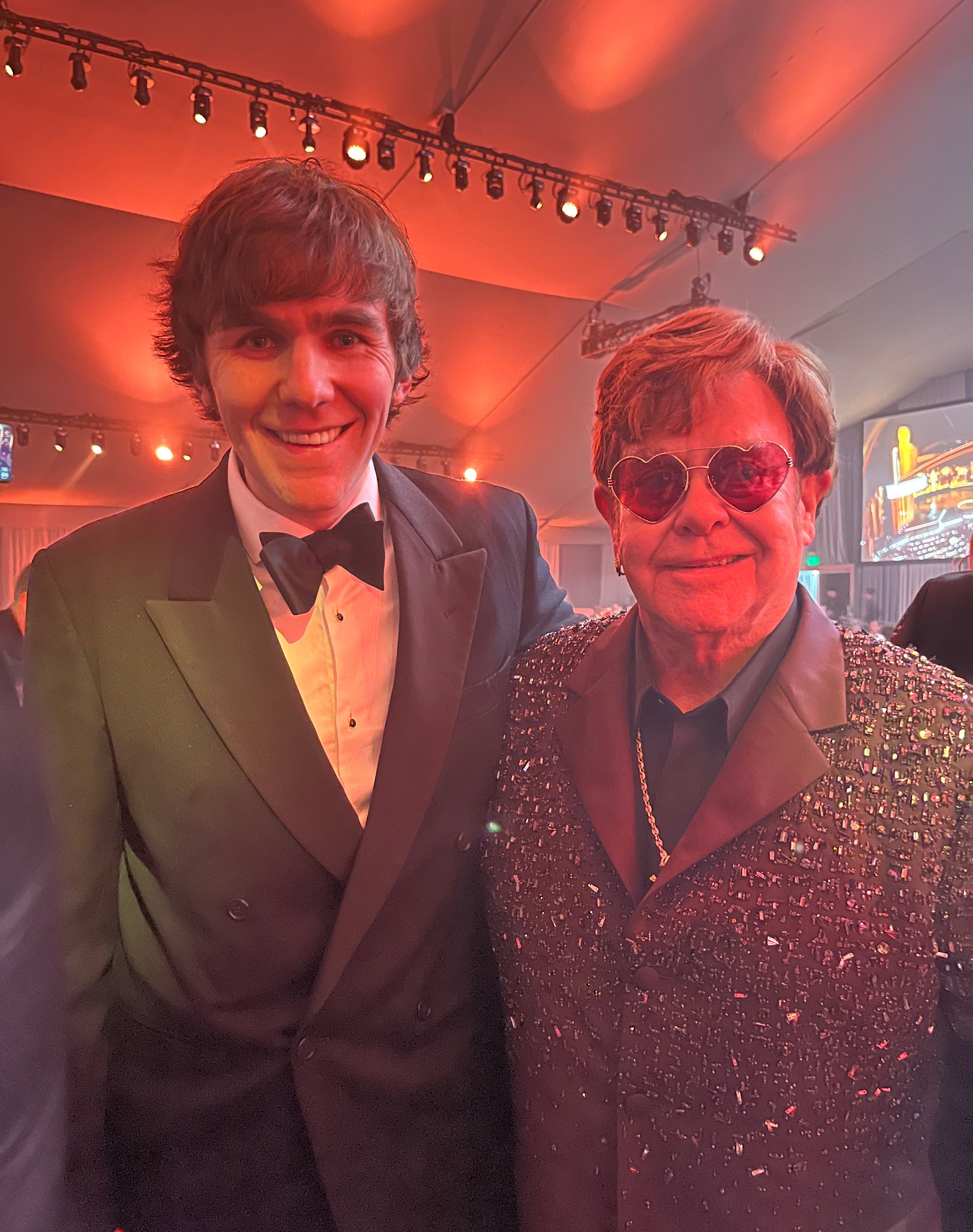 Tom Cridland with Sir Elton John at the EJAF Oscars party, 2023